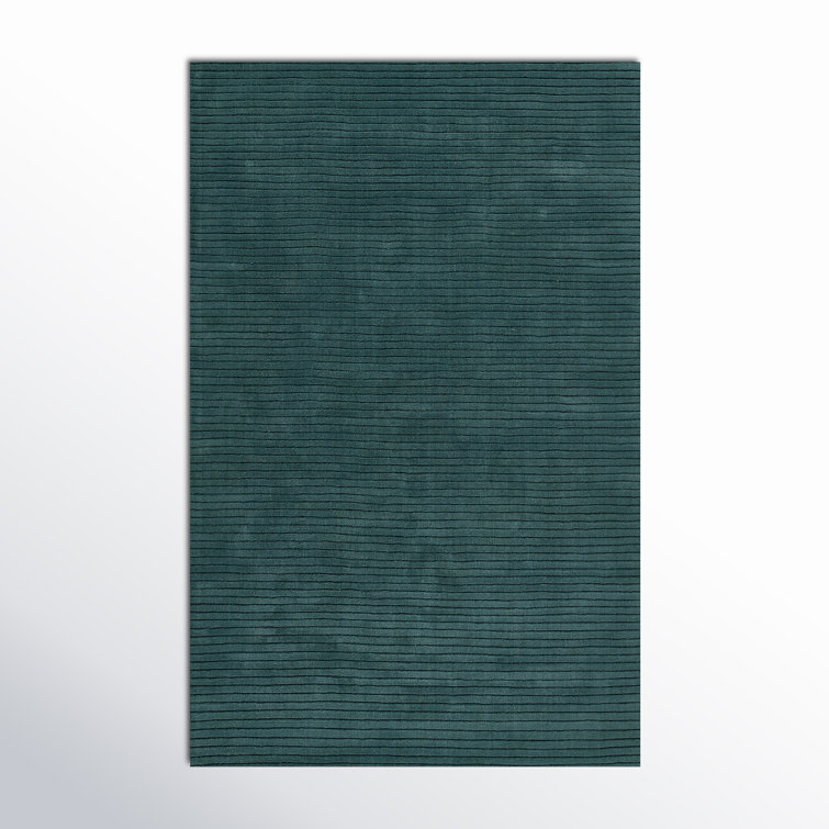 Guiness Solid Color Hand Loomed Wool Area Rug in Blue