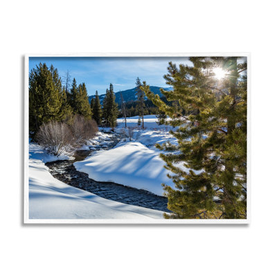 " River Flowing Between Snowy Slopes Distant Mountain " by Steve Smith