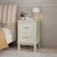 Table de chevet 2 tiroirs crème avec poignées dorées et rangement compact