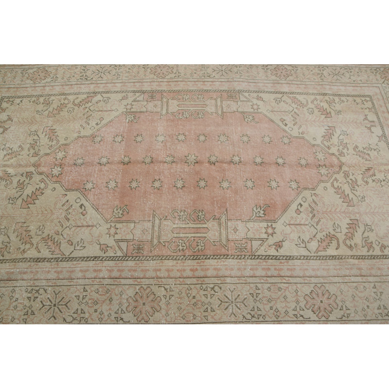 Tapis turc traditionnel fabriqué à la main dans des tons pastel doux, idéal pour la décoration orientale