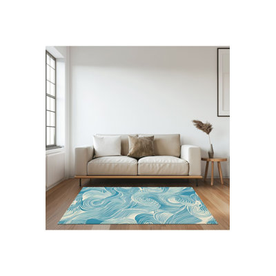 Tapis à motif ondulé bleu clair avec base tissée lavable à la machine