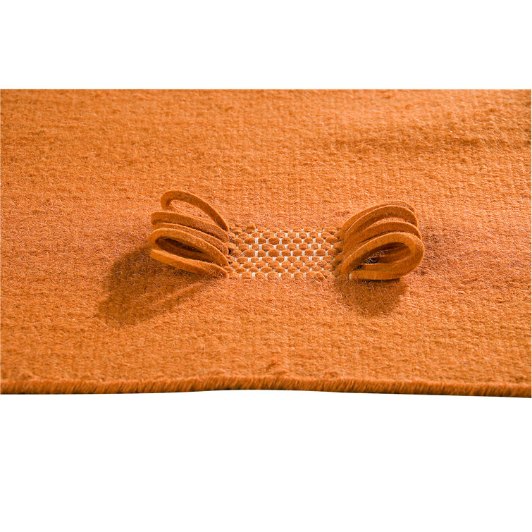 Tapis zone orange oeillet