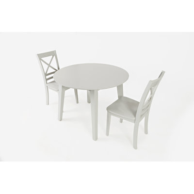 Iyad Extendable Round Solid Wood Dining Table