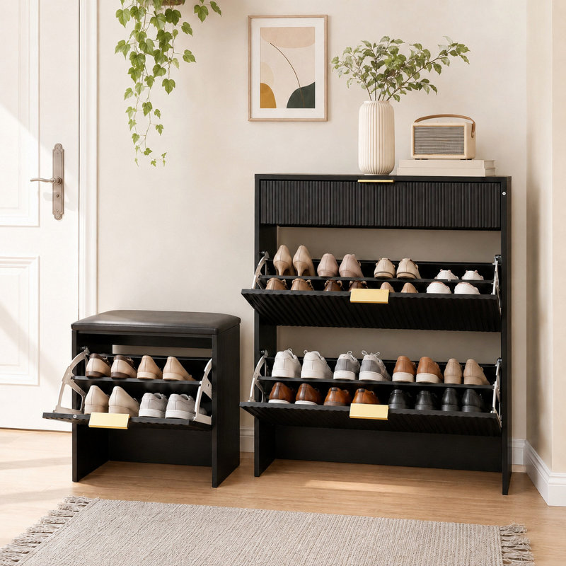 Ensemble d'armoire à chaussures cannelée avec banc à chaussures rembourré et poignées dorées. Noir