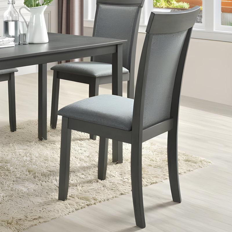 Chaise de salle à manger rembourrée en polyester Roxa