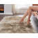 Blakes Solid Color Handmade Faux Sheepskin Area Rug in Beige