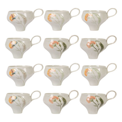 Tasses en grès peintes à la main avec motifs floraux dans un glacis réactif