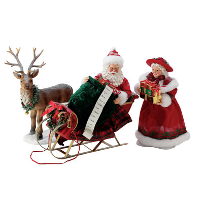 Possible Dreams Christmas Traditions Santa and Mrs. Claus Filling the Sleigh 4-Piece Figurine Set