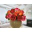 Arrangement de vraies roses dans un vase
