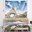 Tapisserie Eiffel sous un ciel nuageux foncé-873976718