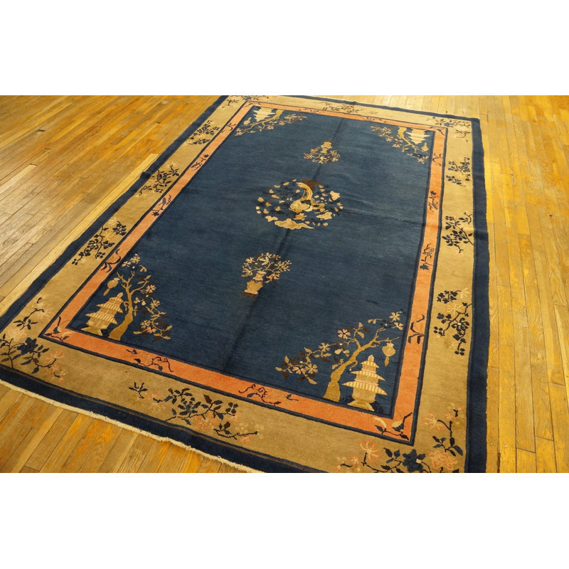 Tapis bleu antique à motif de médaillon floral