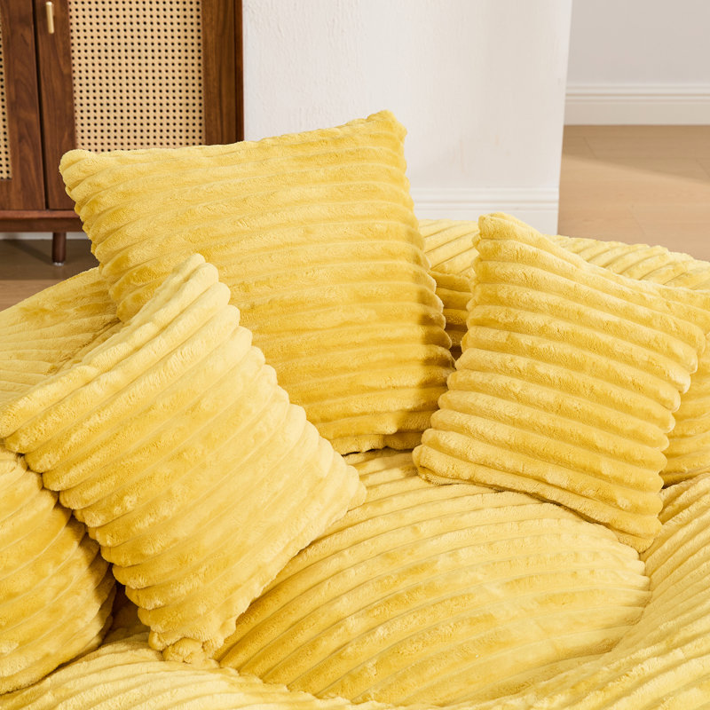 Grand pouf en velours côtelé avec rembourrage en mousse haute densité, idéal pour se détendre pendant les jeux vidéo et pour s'intégrer parfaitement dans les espaces de décoration modernes.