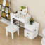 Meuble-lavabo de maquillage avec miroir rabattable, tiroirs, éclairage DEL et tabouret-1200169144