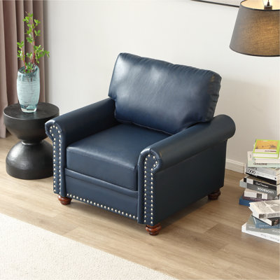 Fauteuil de salon simple avec pieds en bois et similicuir bleu marine