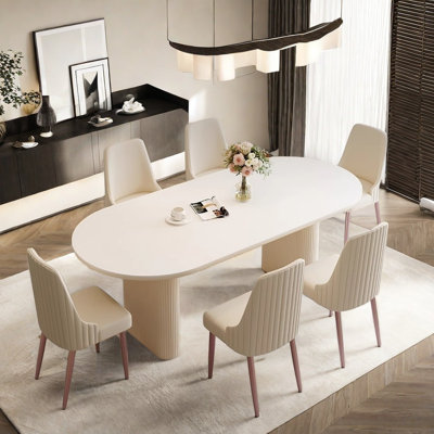Table à manger ovale simple de style crème et chaise