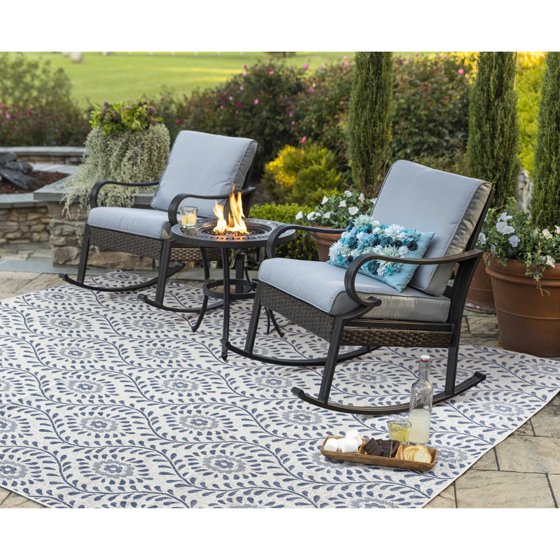 Chaise berçante en métal avec coussins Malia
