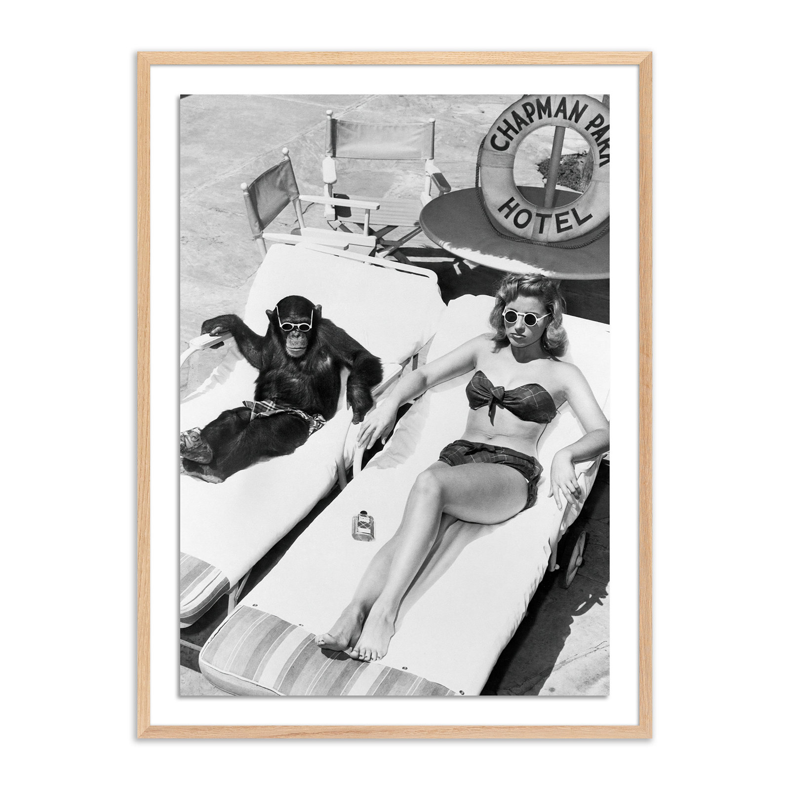 Woman Sunbathing With Chimpanzee by Getty Images, White Oak Framed, 40" H x 30" W