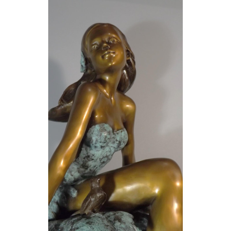 Girl sitting on maple
