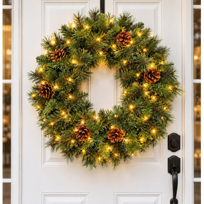 Couronne de pin artificielle 24 po avec pommes de pin et lumières DEL pré-éclairées, couronne de porte d'entrée verte pour décoration de Noël