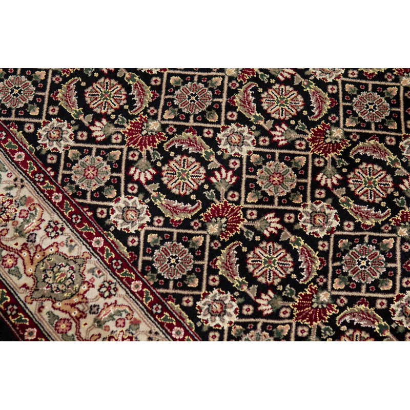 Tapis noir et ivoire de haute qualité noué à la main