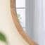 Miroir mural circulaire avec cadre en bois-655637364