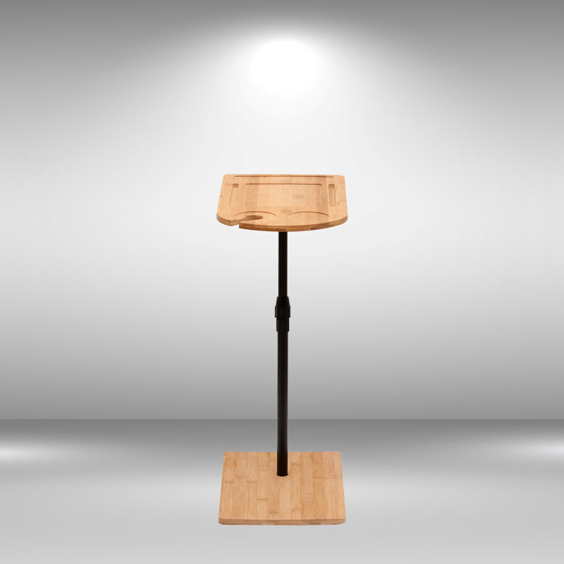 Table de canapé réglable en bambou avec un design ovale en forme de C.