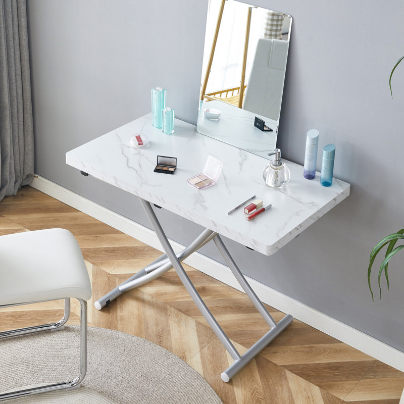 Table élévatrice multifonctionnelle moderne avec plateau en panneau de fibres à densité moyenne de 0,8 po d'épaisseur et pieds en métal argenté, pouvant être utilisée comme coiffeuse, table basse, table de salle à manger et table de bureau.