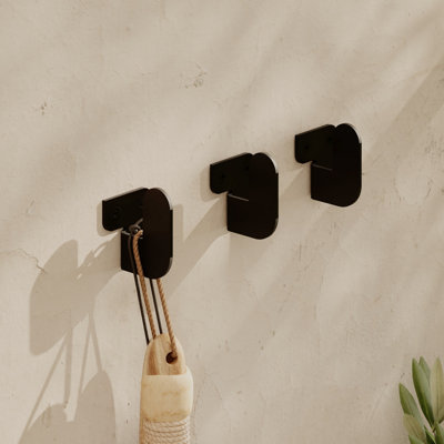 Kishma Heavy-Duty Wall Hanger, 100% Metal, Black | Dimensions: 1.3 x 1.7 x 1.3 inches | Supports Up to 6.6 lbs | Static Dyed Iron | Easy Wall Mounting with Screws | Ideal for Organizing Tools, Coats, and More