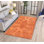 Tapis décoratif orange à motif tissé rétro