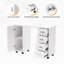 Table manucure blanche avec repose-poignets, armoire et tiroirs