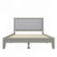 Lit plateforme tapissier en bois massif