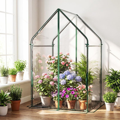 Mini serre de protection pour plantes avec tapis de fond imperméable, structure métallique et cordes de tension, abri portatif contre le gel pour plantes en pot d'extérieur, terrasse et balcon.