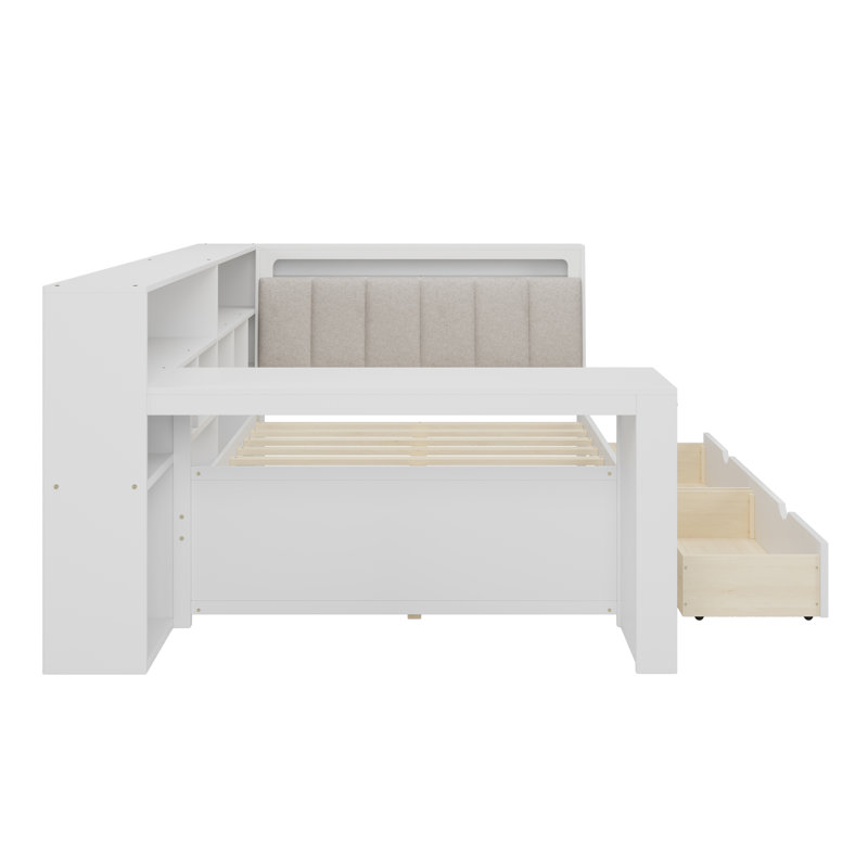 Lit de jour en bois en forme de L avec bureau intégré, bibliothèque de rangement, tête de lit rembourrée, bande lumineuse DEL et tiroirs sous le lit.