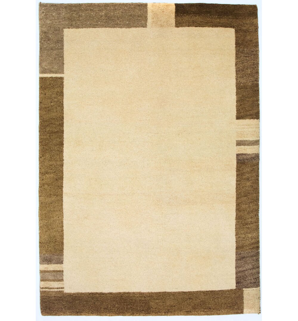 Handgefertigter Teppich Tennyson aus Wolle in Beige