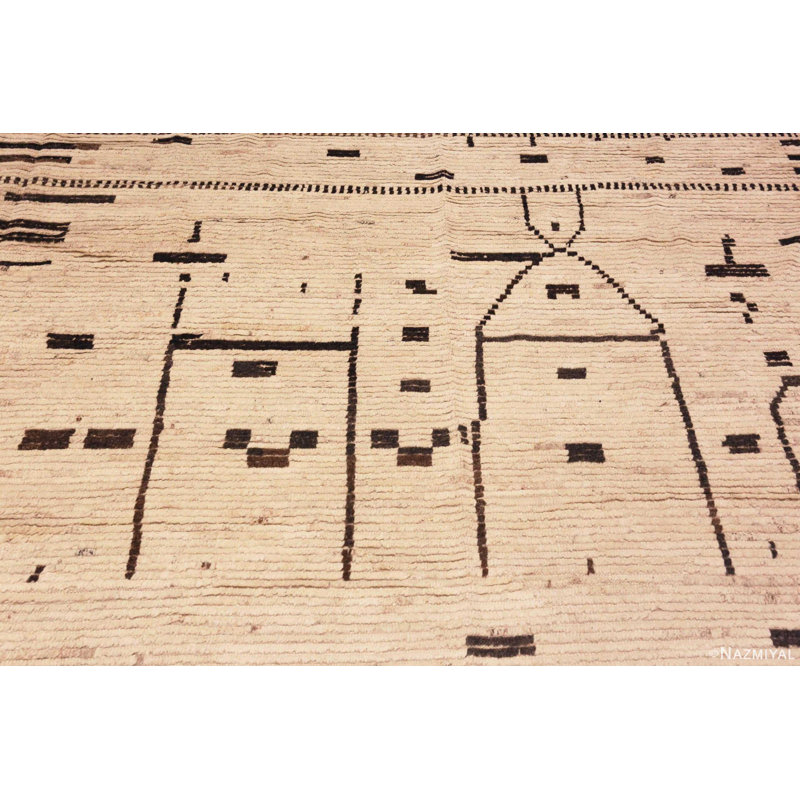 Grand tapis moderne à motif primitif