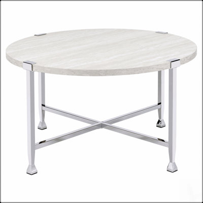 Table basse ronde en chêne blanc et chrome, parfaite pour l'élégance moderne et le charme industriel dans les espaces de vie contemporains.