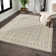 Tapis marocain beige en polypropylène tissé à la machine
