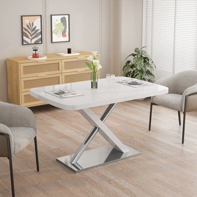 Table rétractable avec base en métal et tubes en acier inoxydable