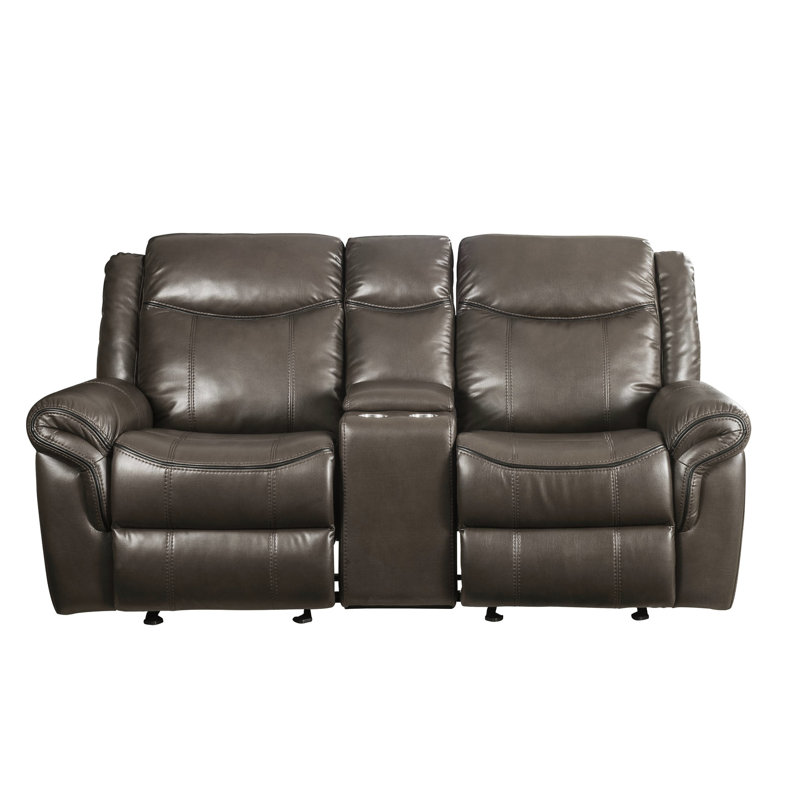 Cuir brun avec fonction de mouvement et console - Densité de mousse D25 Capacité de siège de 220 lb Capacité de 58 po de largeur 21 po de profondeur 19 po de hauteur 26 po de hauteur Accoudoirs à dossier 16 po pour un meilleur soutien