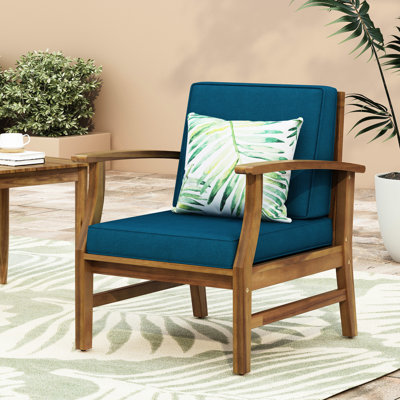 Fauteuil club d'extérieur en bois bleu charmant conçu pour résister aux intempéries