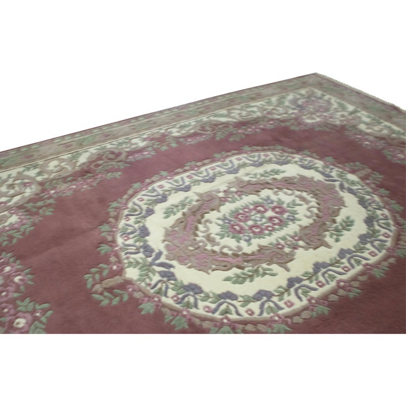 Tapis rose et ivoire noué à la main de haute qualité