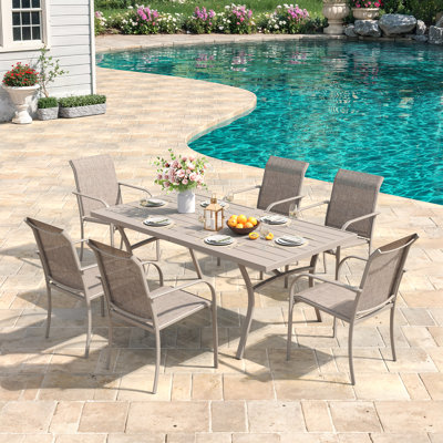 6-Person Patio Dining Set with 63" Rectangular Dining Table and 6 PVC-coated polyester Stackable Chairs