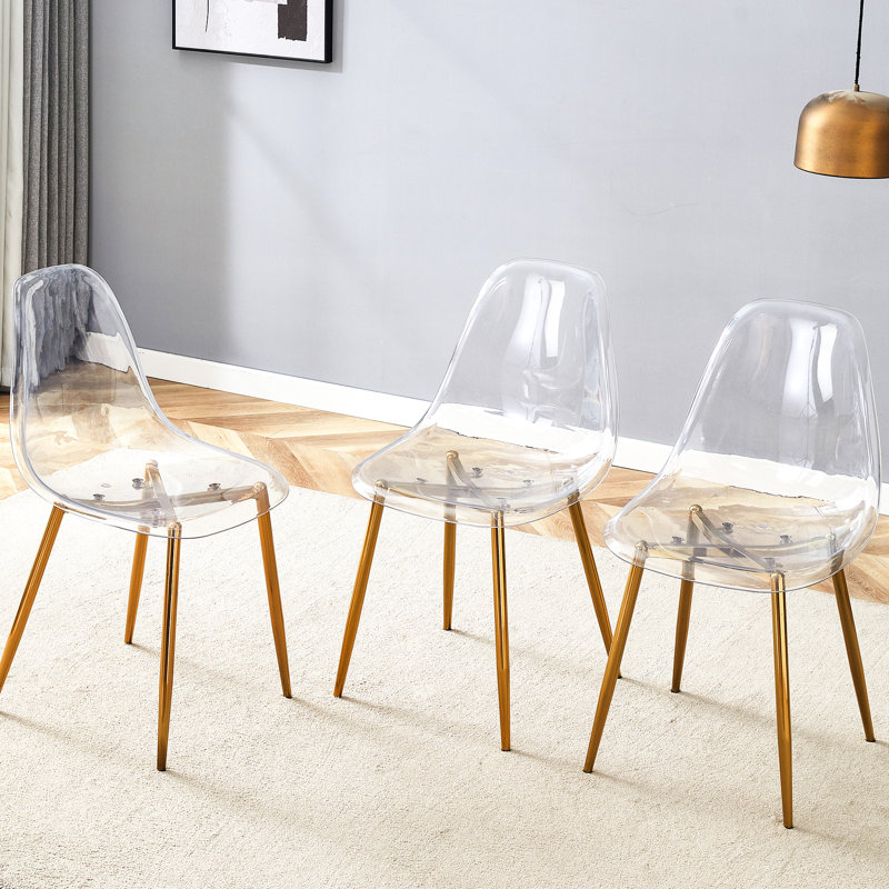 Fauteuil transparent confortable et confortable pour les repas - expérience relaxante Élégant siège à pieds en métal doré Design chic