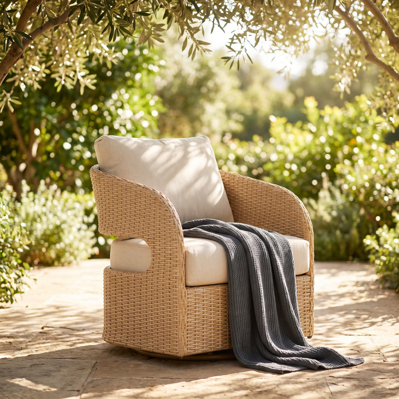 Fauteuil de jardin en osier avec coussins