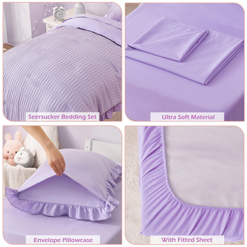 Ensemble de literie pour lit de bébé 4 pièces Seersucker Textured Comprend un édredon, un drap plat, un drap-housse et une taie d'oreiller