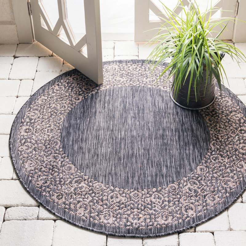 Tapis d'intérieur / extérieur brun / gris en polypropylène tissé à la machine Kavyn