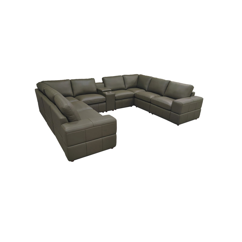 Canapé modulaire à large accoudoirs en cuir assorti