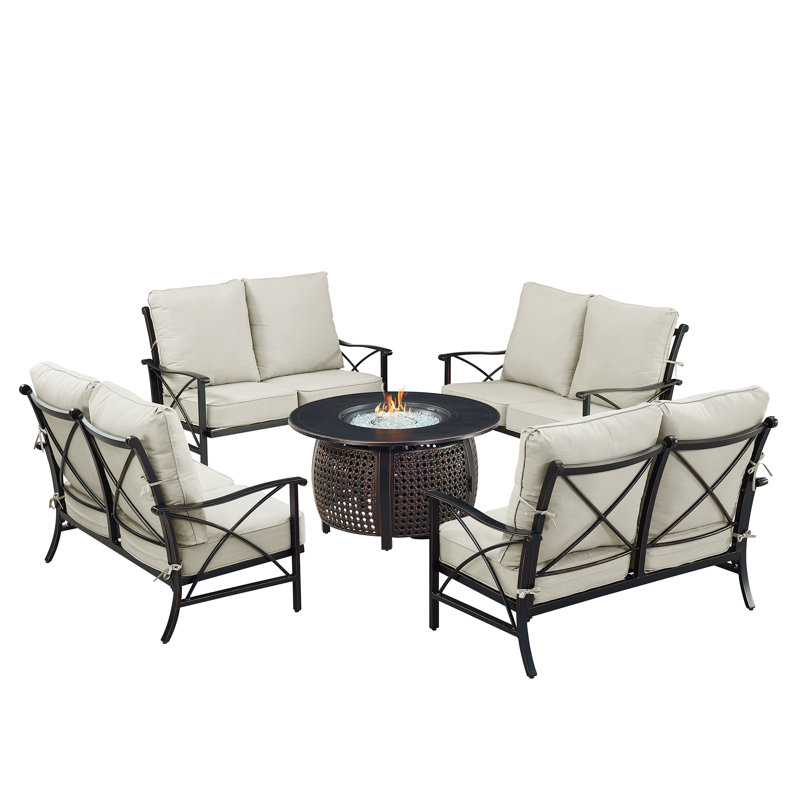 Ensemble de table de foyer en aluminium noir avec quatre causeuses profondes