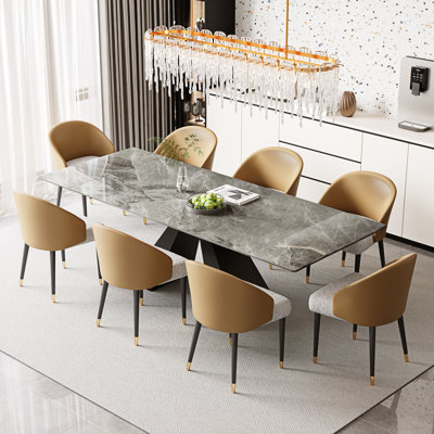 Ensemble de table de salle à manger extensible 94,5 po avec plateau en pierre frittée rectangulaire et 8 chaises en similicuir