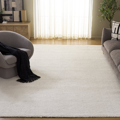 Borinka Solid Color Hand Tufted Wool Area Rug in Ivory